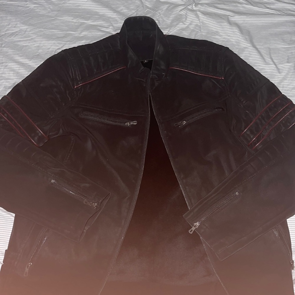 Large leather jacket, black with 4 maroon stripes on each arm. Motorcycle jacket